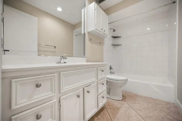 a bathroom with a sink a toilet and a bathtub