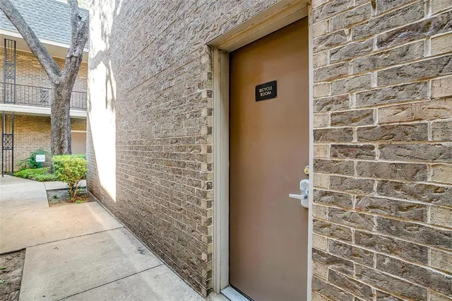 a view of a door and a street view