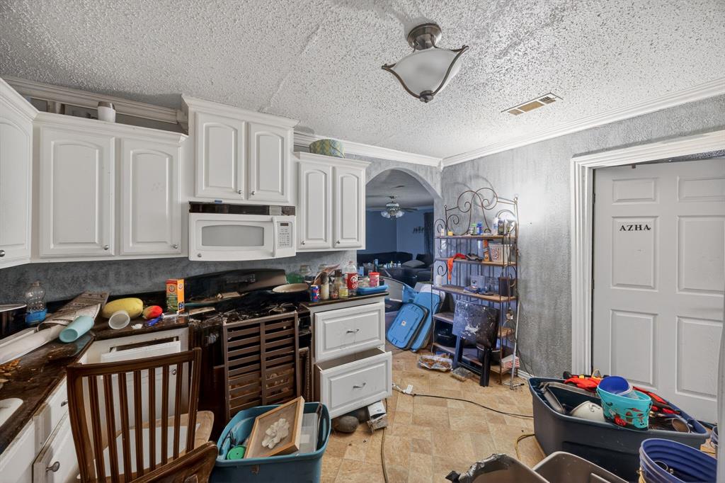 801 North Main Street Dodd City, TX 75438 - Photo 18 of 31 a room with furniture a rug toys and a window