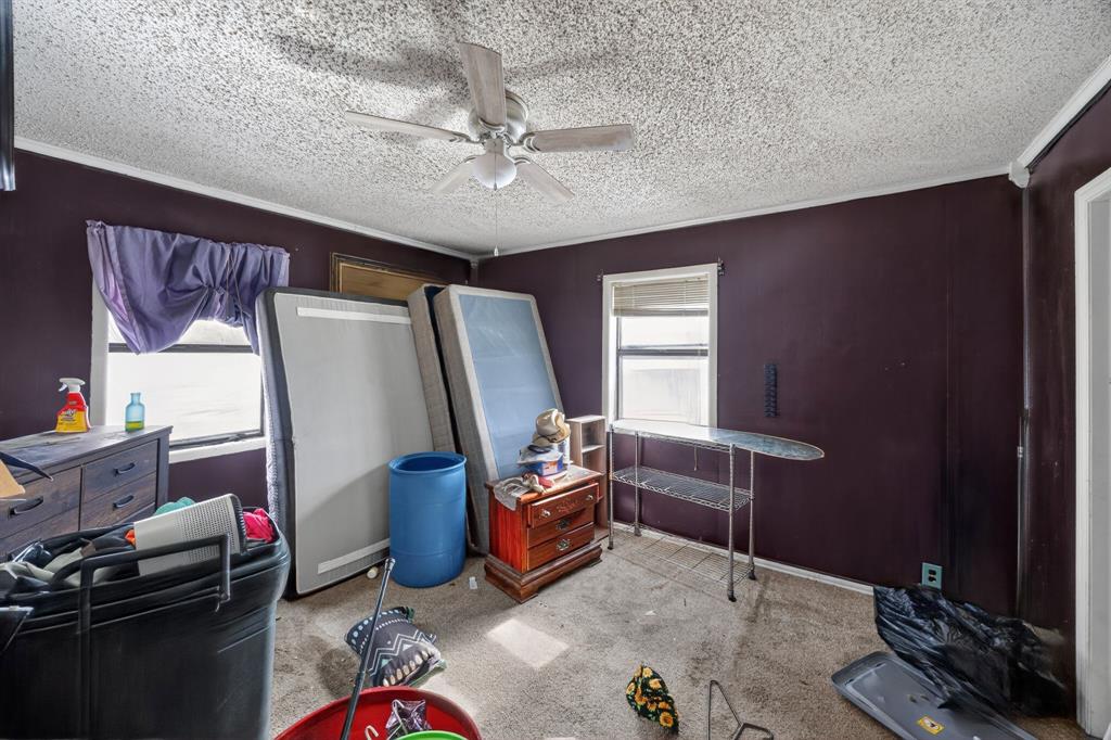 801 North Main Street Dodd City, TX 75438 - Photo 21 of 31 a room with furniture and a mirror