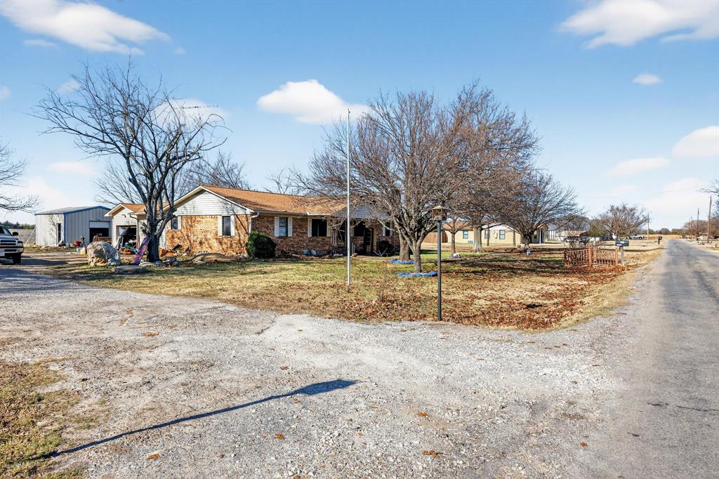 801 North Main Street Dodd City, TX 75438 - Photo 5 of 31 a view of large space with tree s