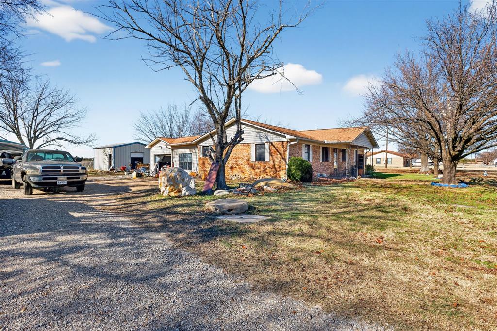 801 North Main Street Dodd City, TX 75438 - Photo 9 of 31 a view of a town with large trees