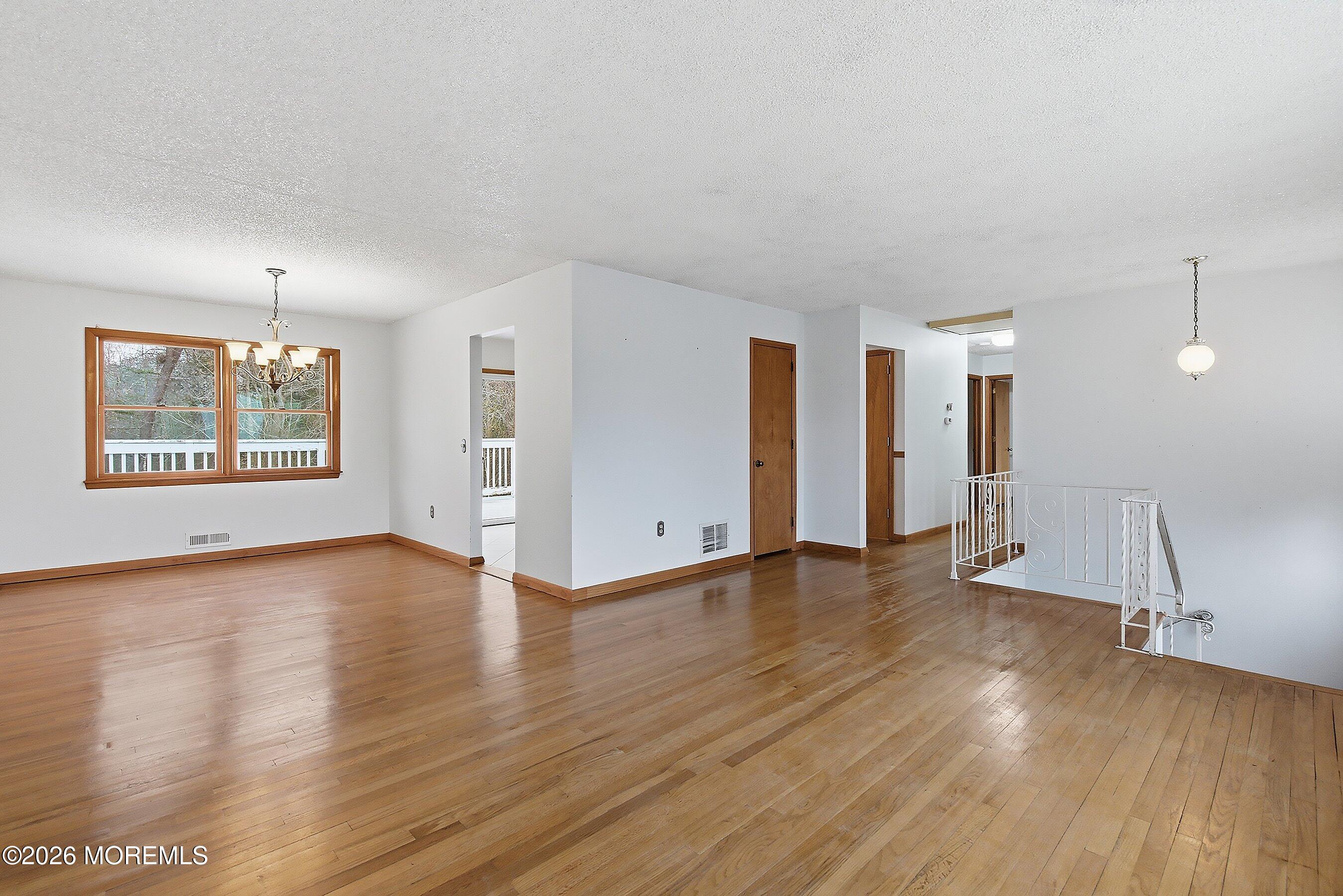 134 Village Way Brick, NJ 08724 - Photo 11 of 47 Living room to dining room