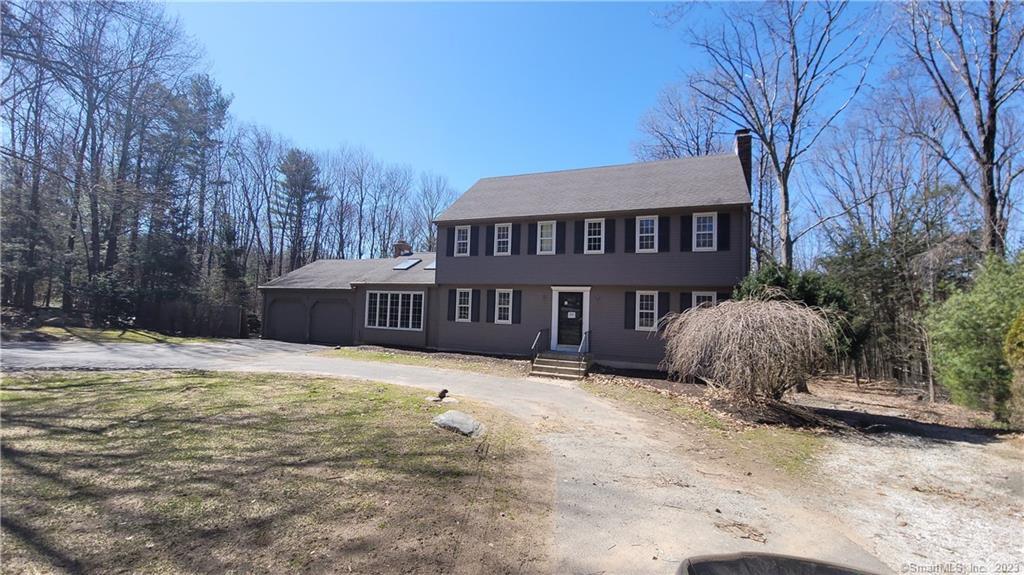 17 High Hill Road Canton, CT 06019 - Photo 1 of 1 a house that has a tree in front of it