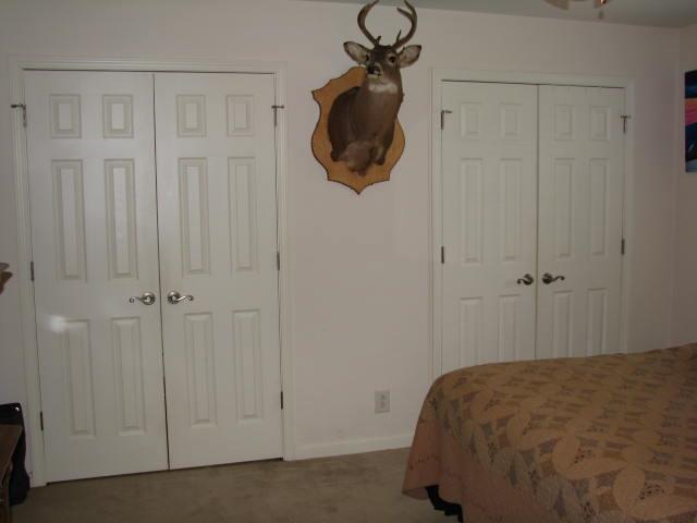 464 Sylvis Road Dickson, TN 37055 - Photo 7 of 10 Master bedroom has Jack/Jill closets. OH and a Deer head ( AVID HUNTER)...