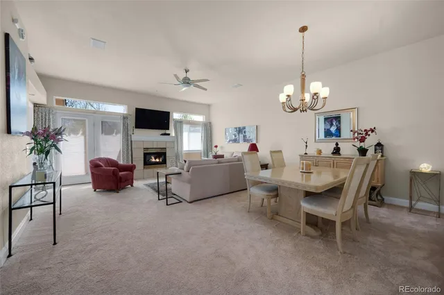 a view of a livingroom with furniture and a chandelier