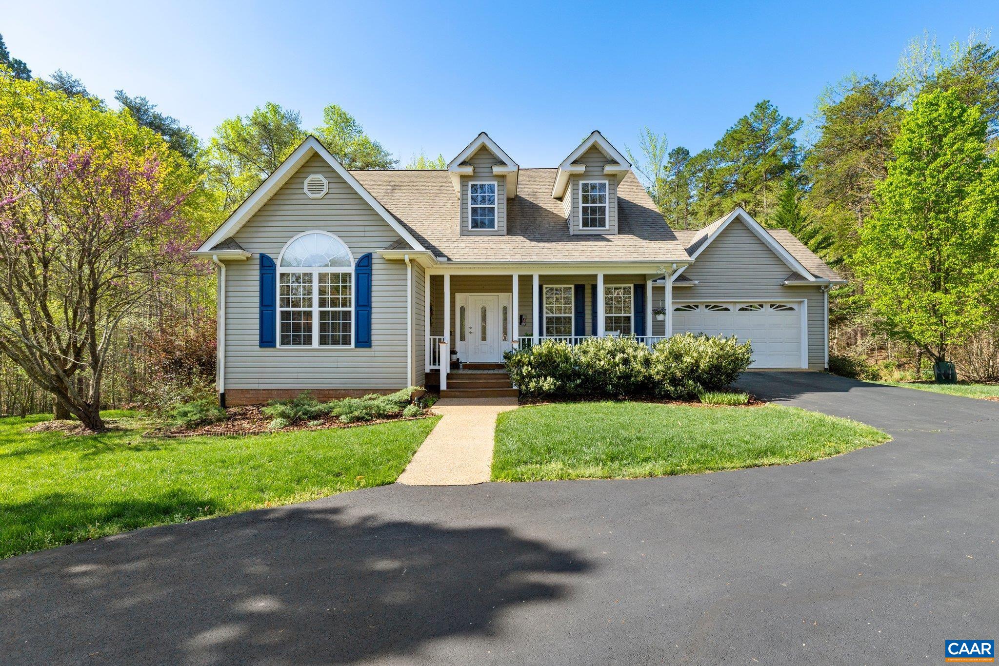 5437 3 Notch Road Louisa, VA 23093 - Photo 1 of 35 a front view of a house with a yard and garage