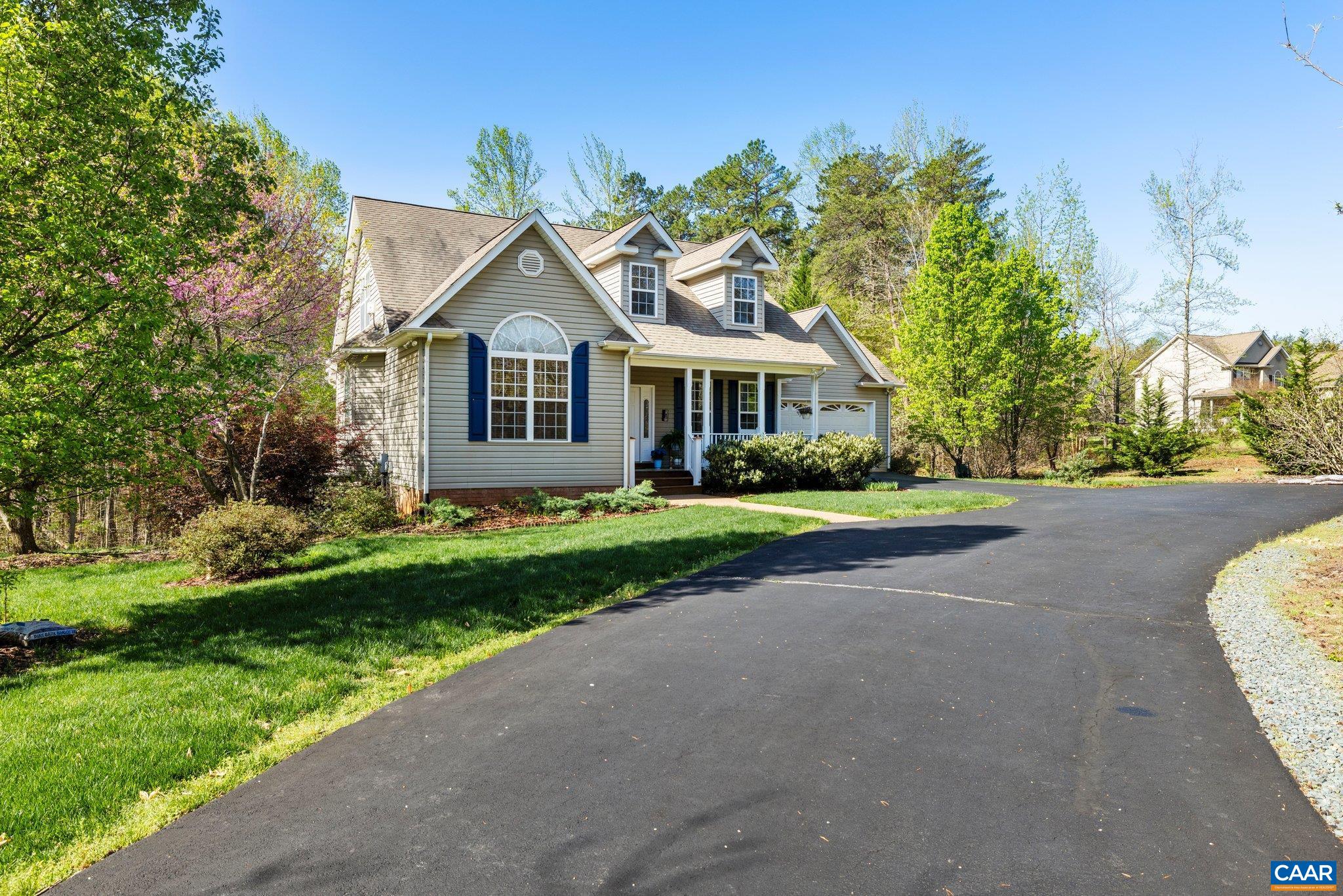 5437 3 Notch Road Louisa, VA 23093 - Photo 2 of 35 a front view of a house with a garden