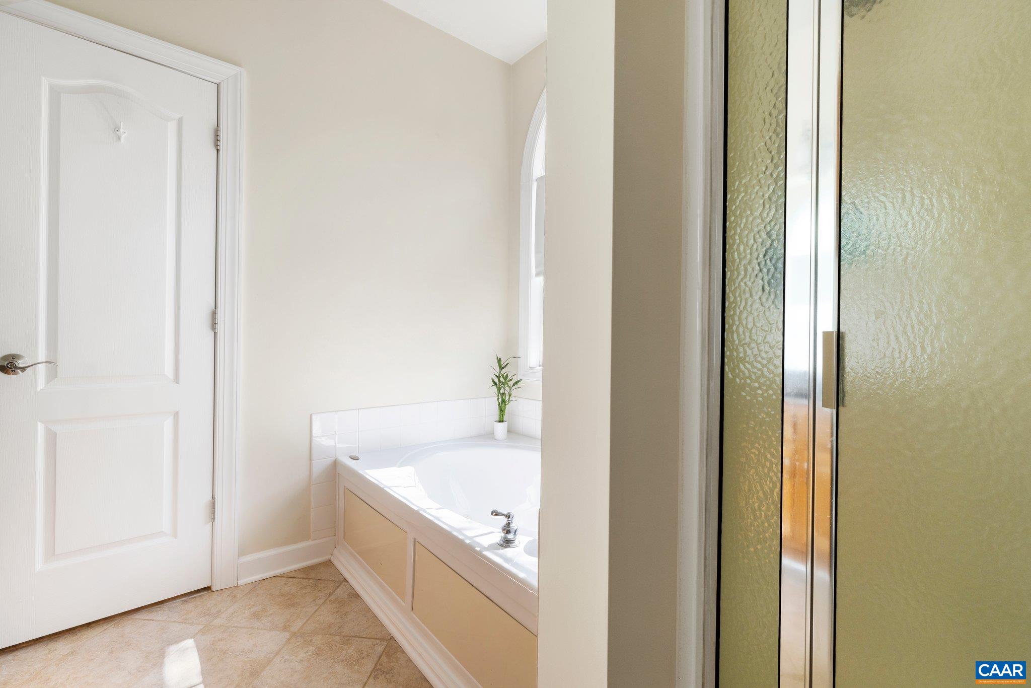 5437 3 Notch Road Louisa, VA 23093 - Photo 23 of 35 a bathroom with a tub and a sink