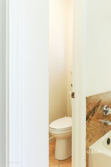 240 West Sequoia Place Ridgecrest, CA 93555 - Photo 29 of 32 a bathroom with a toilet and a shower