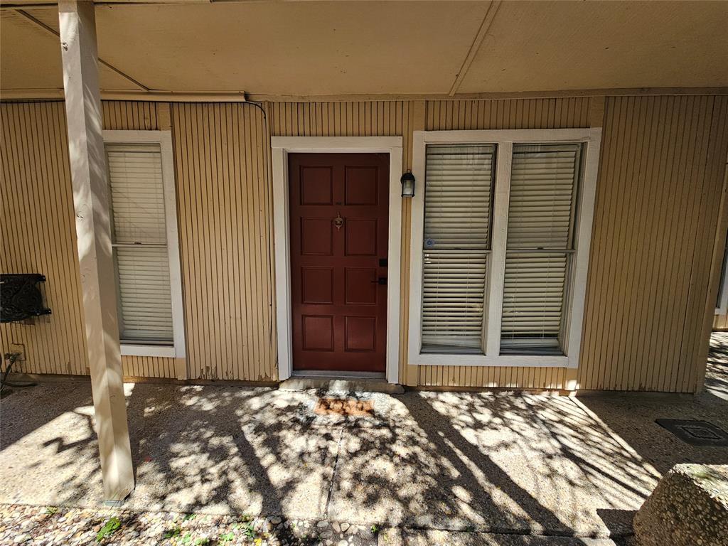 4327 Holland Avenue, Unit 102 Dallas, TX 75219 - Photo 19 of 20 a front view of a house