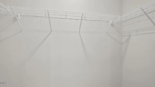 a view of a room with racks on the wall