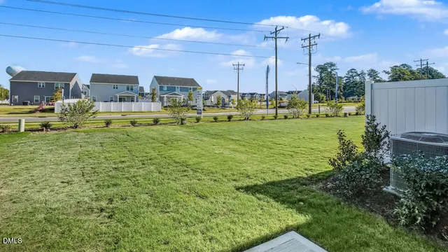 a view of a house with yard