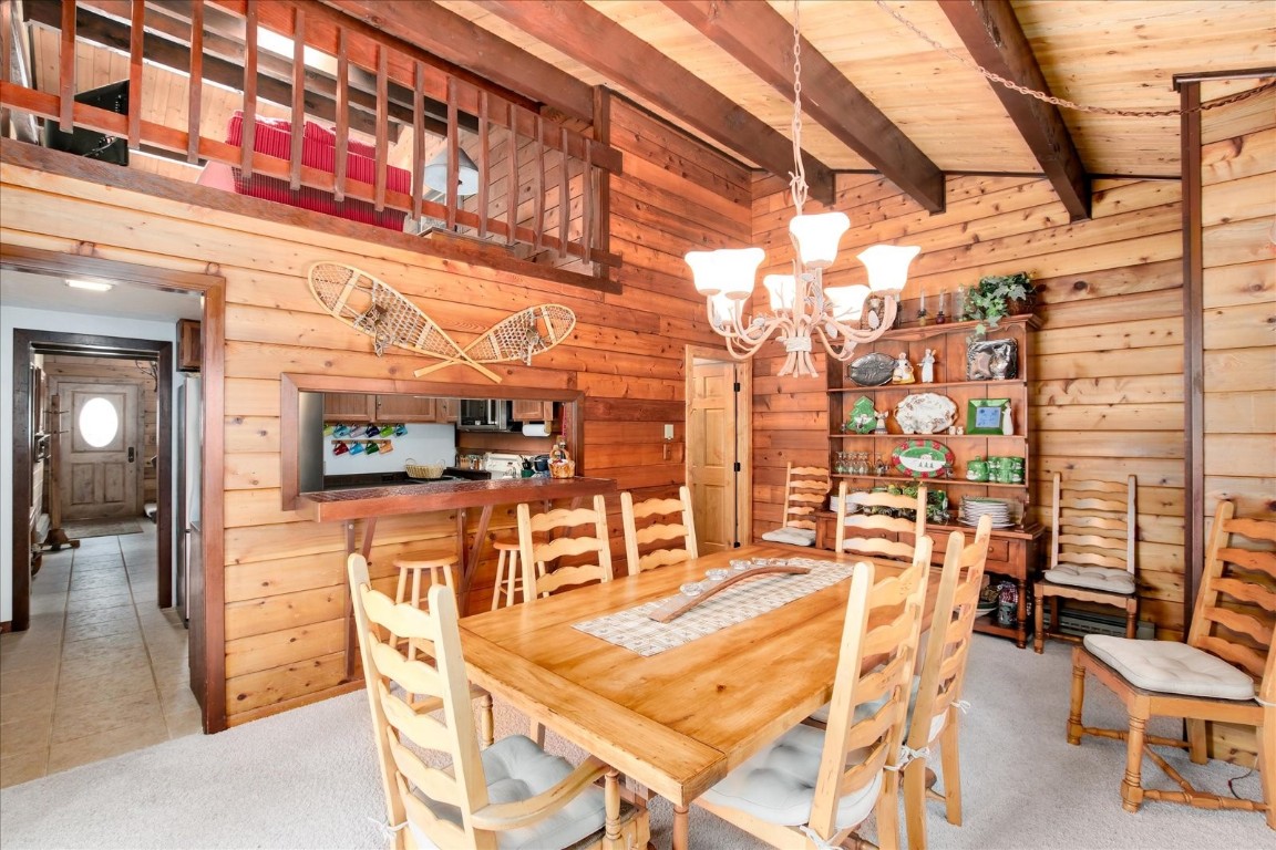 522 Wellington Road Breckenridge, CO 80424 - Photo 19 of 43 a view of a patio with dining table and chairs