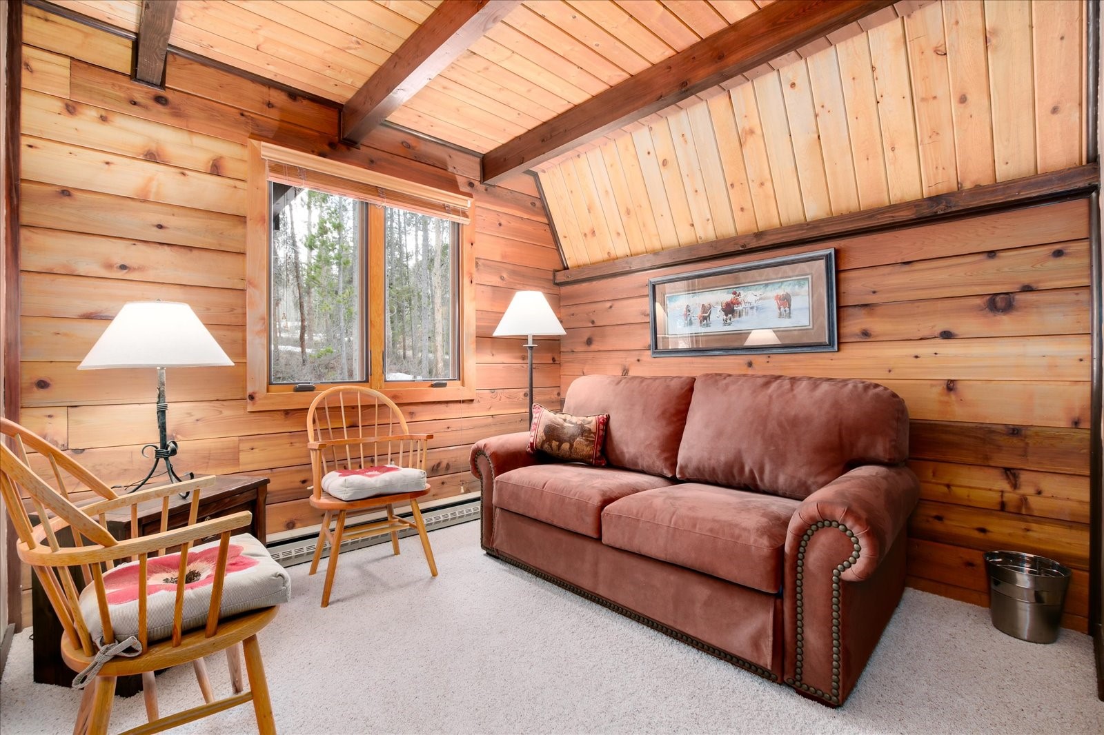 522 Wellington Road Breckenridge, CO 80424 - Photo 24 of 43 a living room with furniture and a fireplace