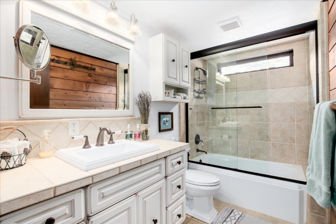 522 Wellington Road Breckenridge, CO 80424 - Photo 4 of 43 a bathroom with a sink a toilet and shower