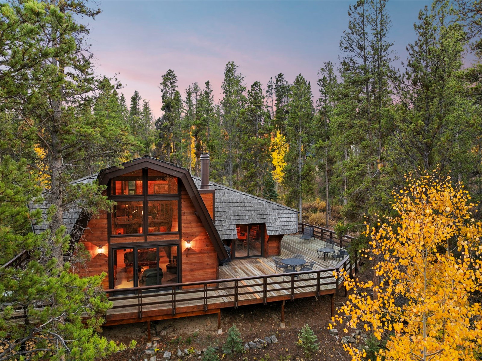 522 Wellington Road Breckenridge, CO 80424 - Photo 42 of 43 a view of a wooden deck with a trees