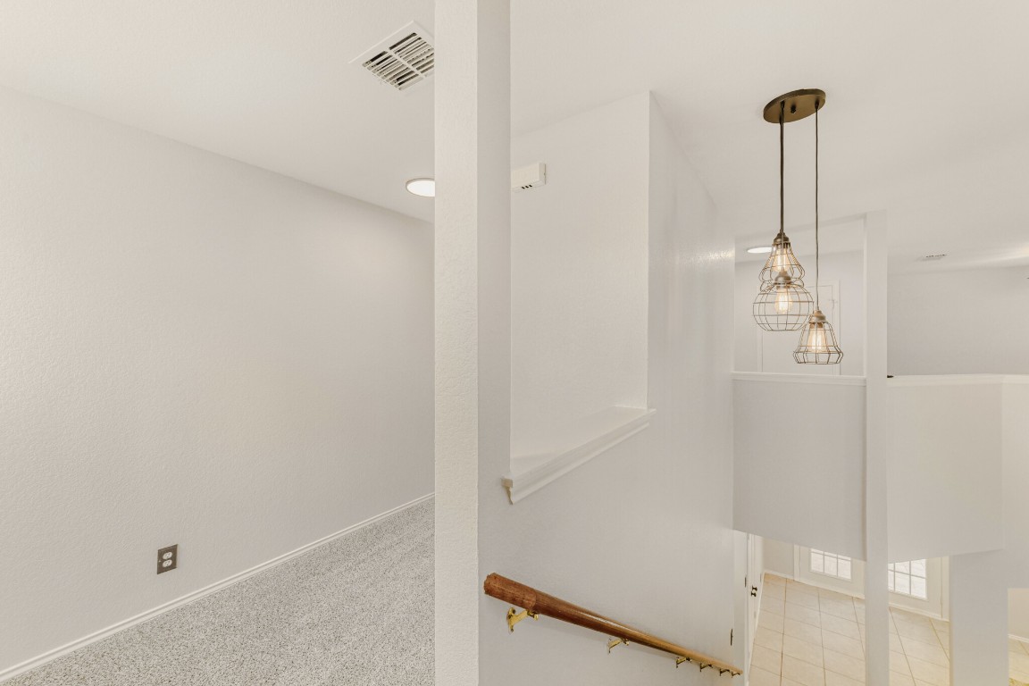 4010 Reeders Drive Austin, TX 78725 - Photo 4 of 26 Detailed view of carpet floors and baseboards