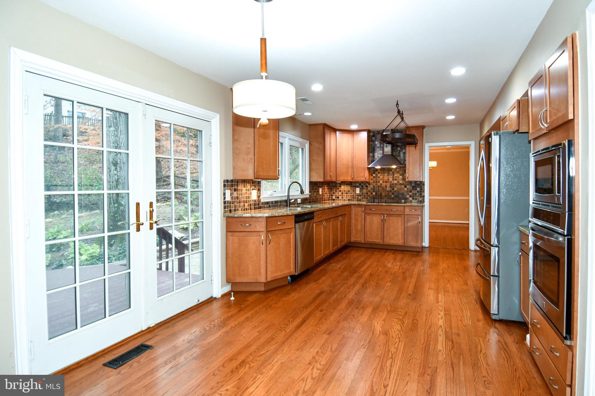 13135 Hutchinson Way Silver Spring, MD 20906 - Photo 17 of 64 DOOR ACCESS TO EXTERIOR REAR DECK