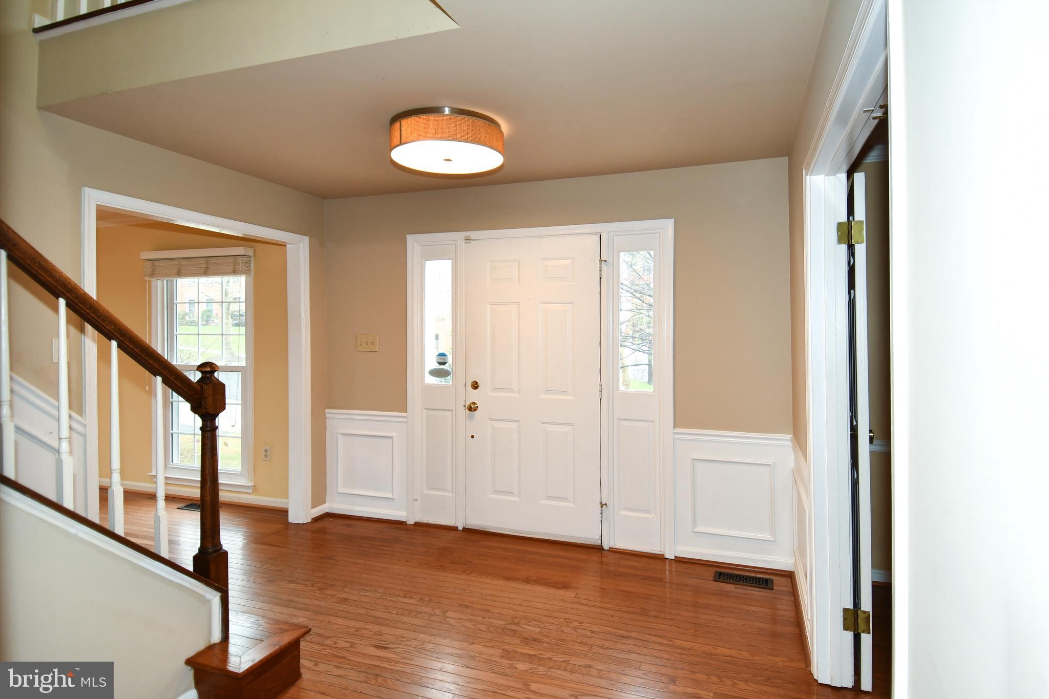 13135 Hutchinson Way Silver Spring, MD 20906 - Photo 3 of 64 a view of an entryway with wooden floor