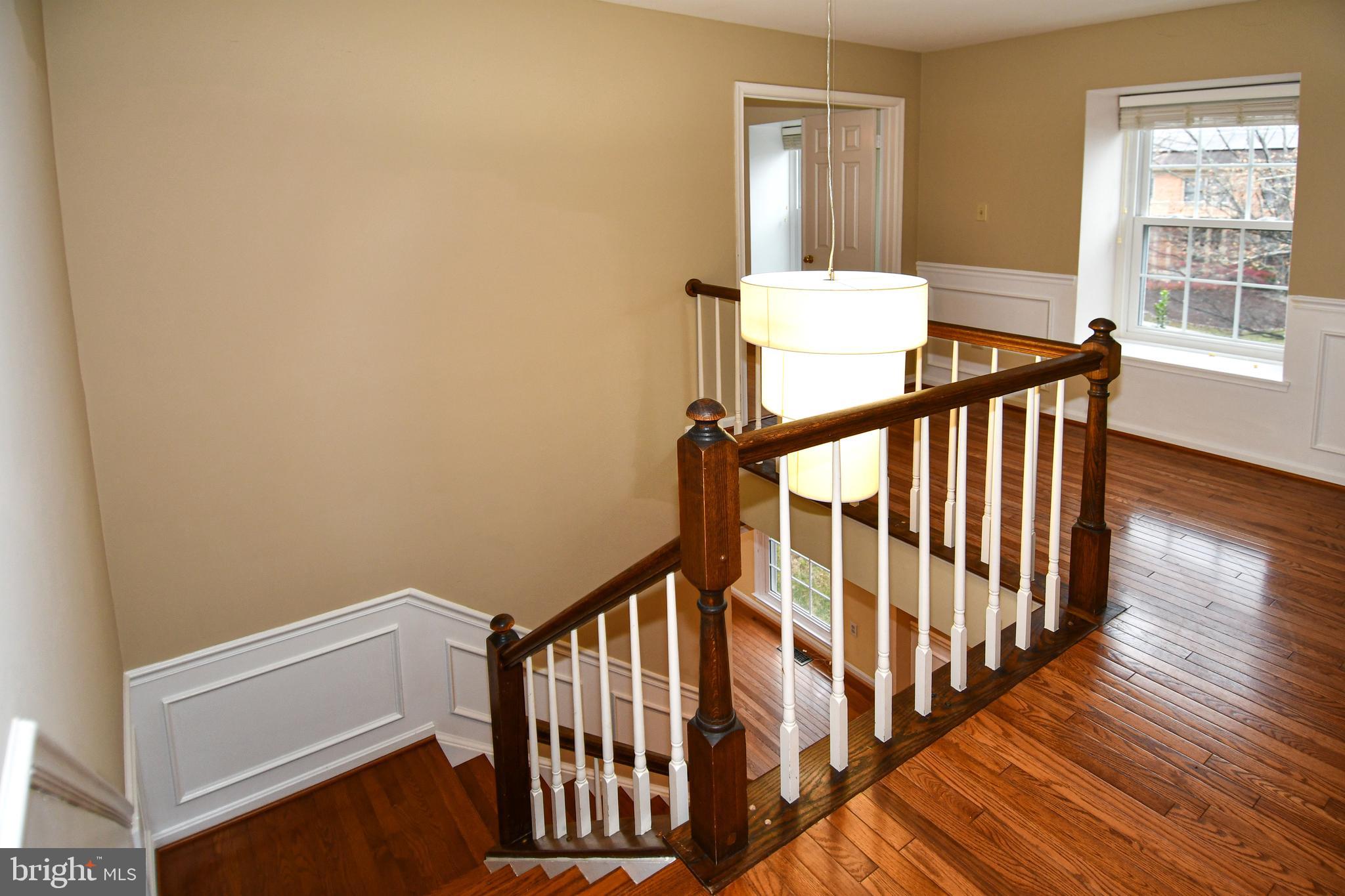 13135 Hutchinson Way Silver Spring, MD 20906 - Photo 31 of 64 a view of entryway with wooden floor