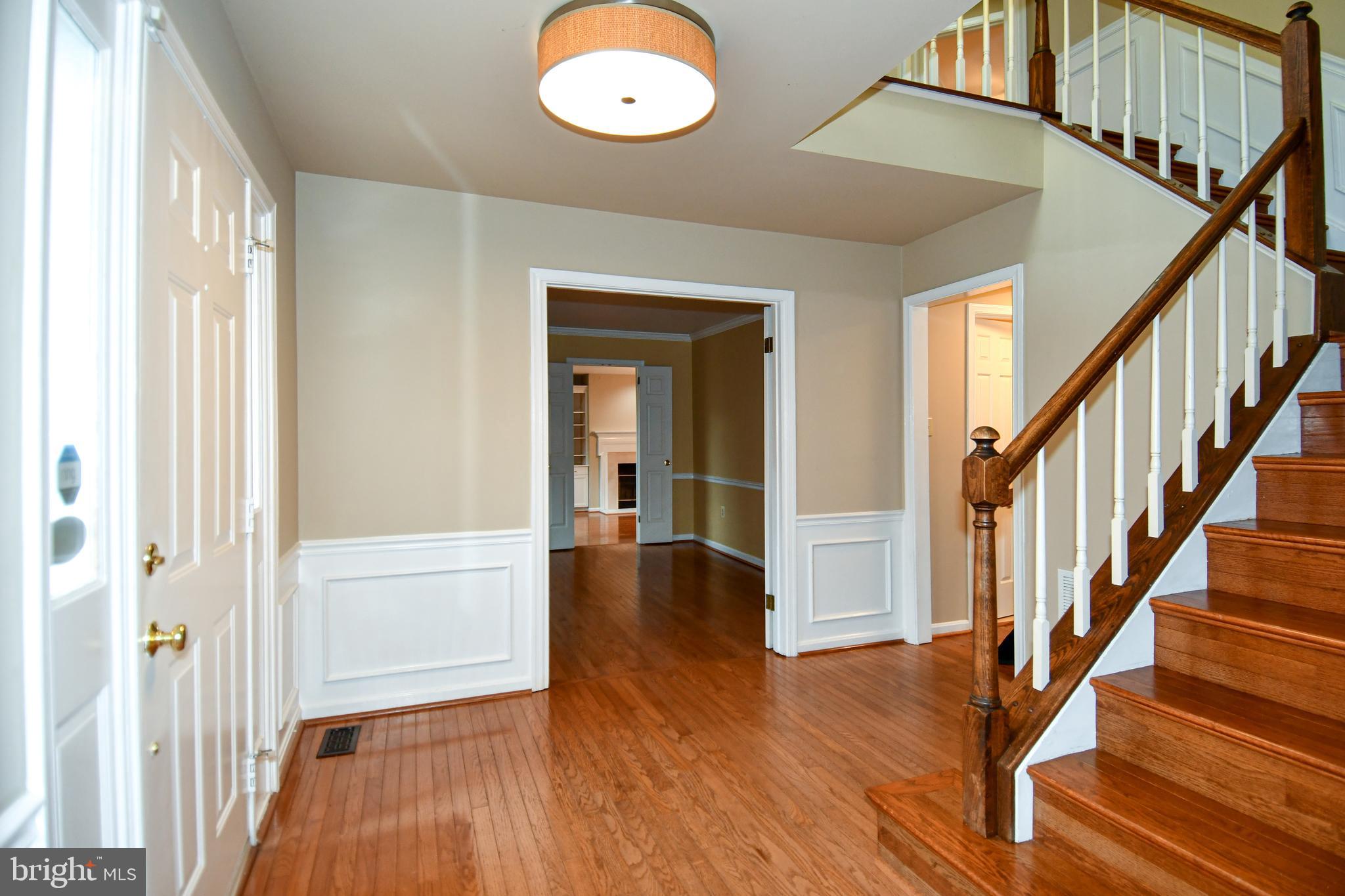 13135 Hutchinson Way Silver Spring, MD 20906 - Photo 4 of 64 FOYER LEFT DOOR ENTRANCE TO OFFICE