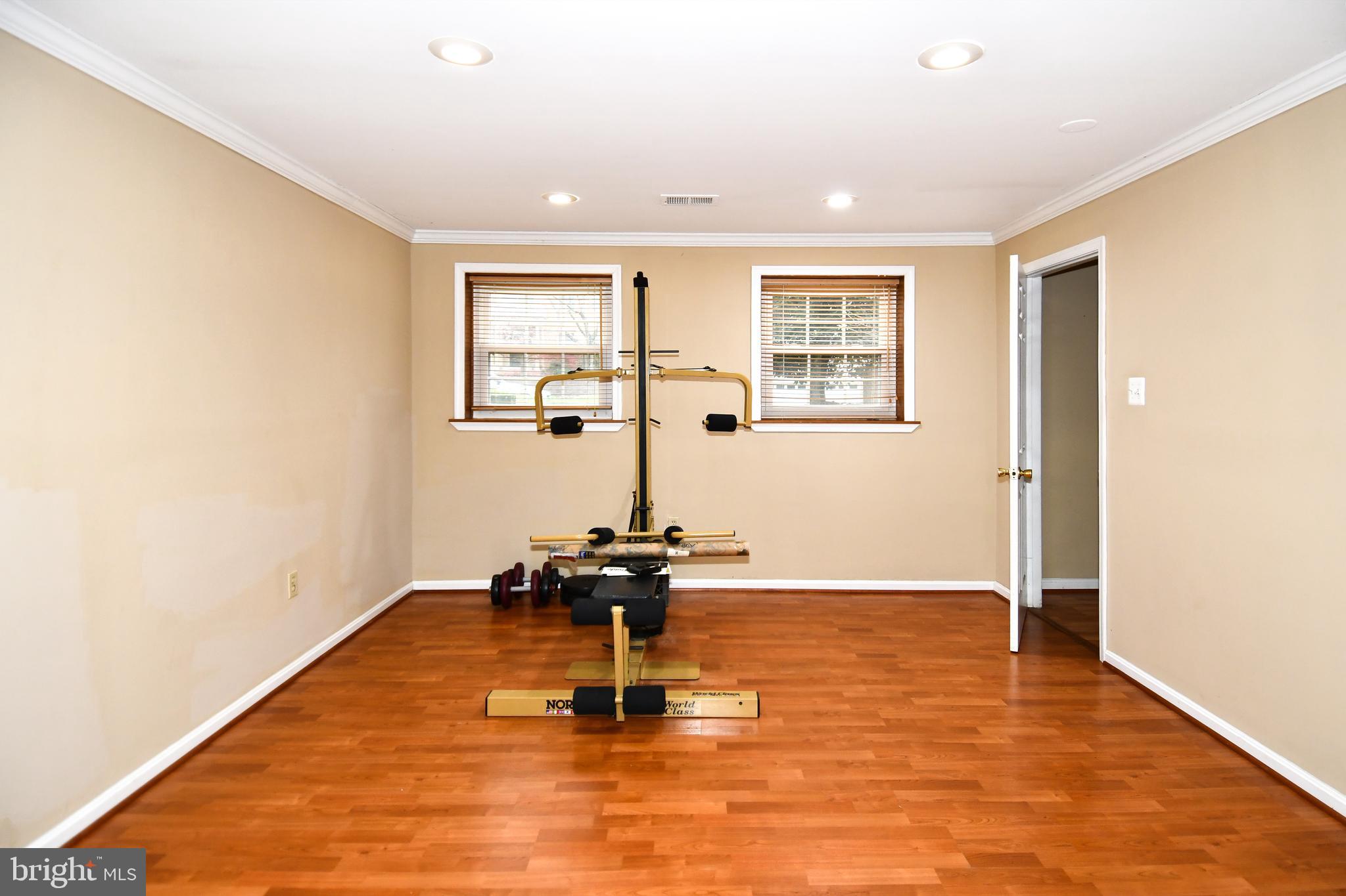 13135 Hutchinson Way Silver Spring, MD 20906 - Photo 54 of 64 a view of room with a window and wooden floor