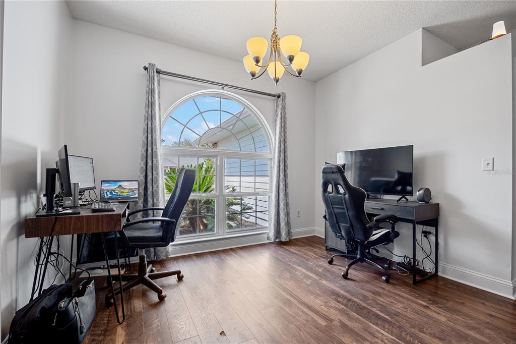 9312 Southwest 152nd Court Lake Butler, FL 32054 - Photo 13 of 37 a view of a workspace with furniture and a window