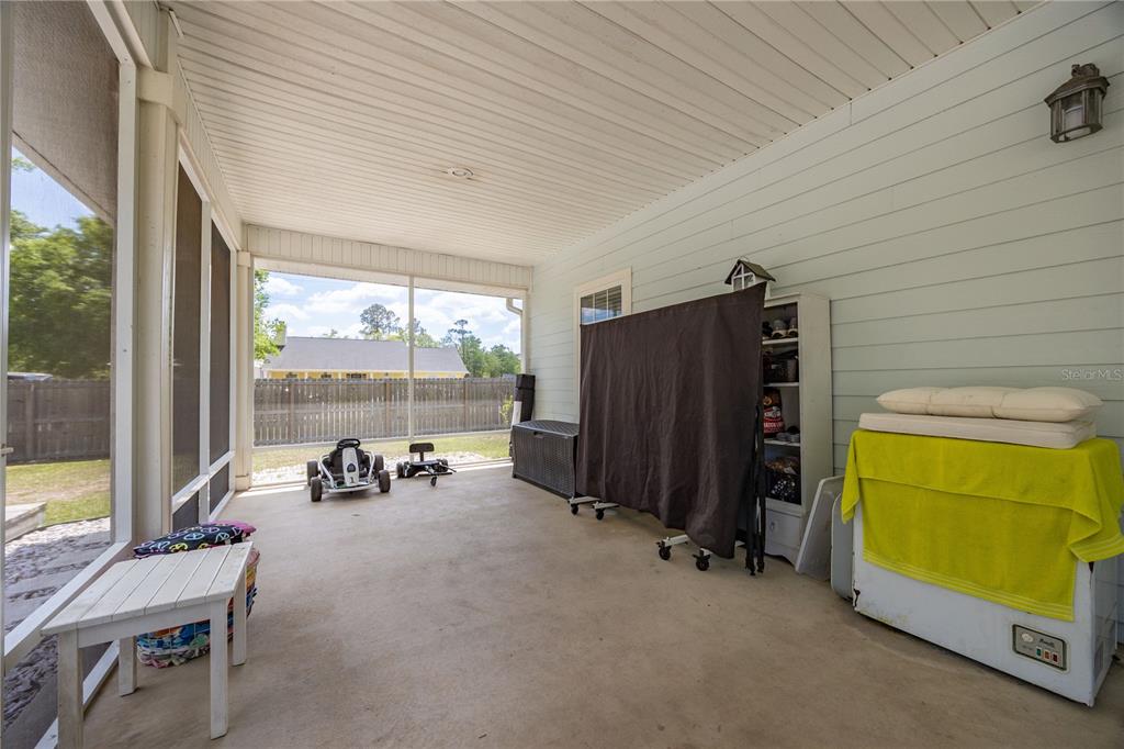 9312 Southwest 152nd Court Lake Butler, FL 32054 - Photo 23 of 37 a view of a room with gym equipment and a large window
