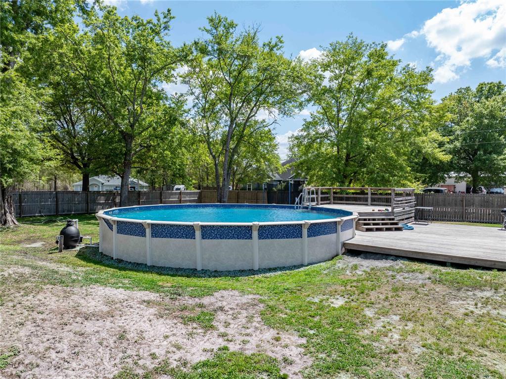 9312 Southwest 152nd Court Lake Butler, FL 32054 - Photo 30 of 37 a view of a yard with a fountain