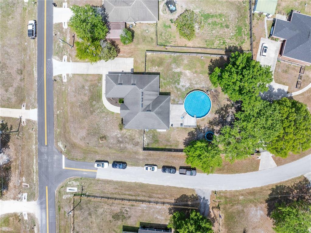 9312 Southwest 152nd Court Lake Butler, FL 32054 - Photo 32 of 37 an aerial view of a house with a swimming pool