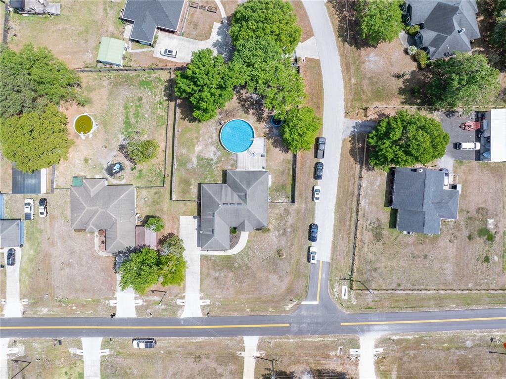 9312 Southwest 152nd Court Lake Butler, FL 32054 - Photo 33 of 37 aerial view of a house with a garden and potted plants