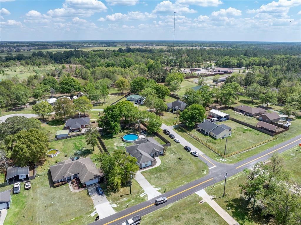 9312 Southwest 152nd Court Lake Butler, FL 32054 - Photo 36 of 37 an aerial view of residential houses with outdoor space and ocean view