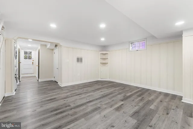 a view of a livingroom with wooden floor