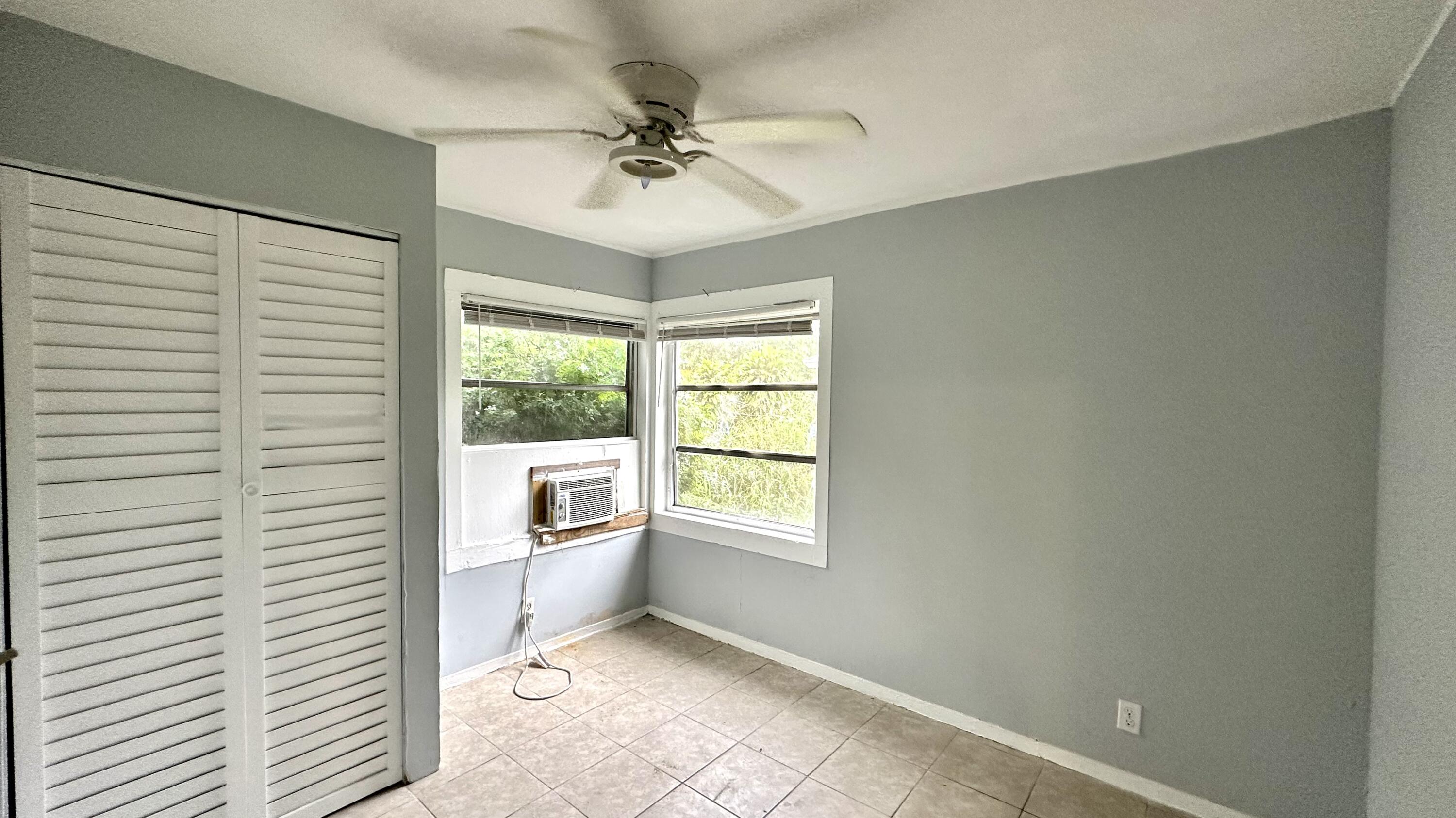 3804 Miller Avenue, Unit C West Palm Beach, FL 33405 - Photo 5 of 10 a view of an empty room with a window