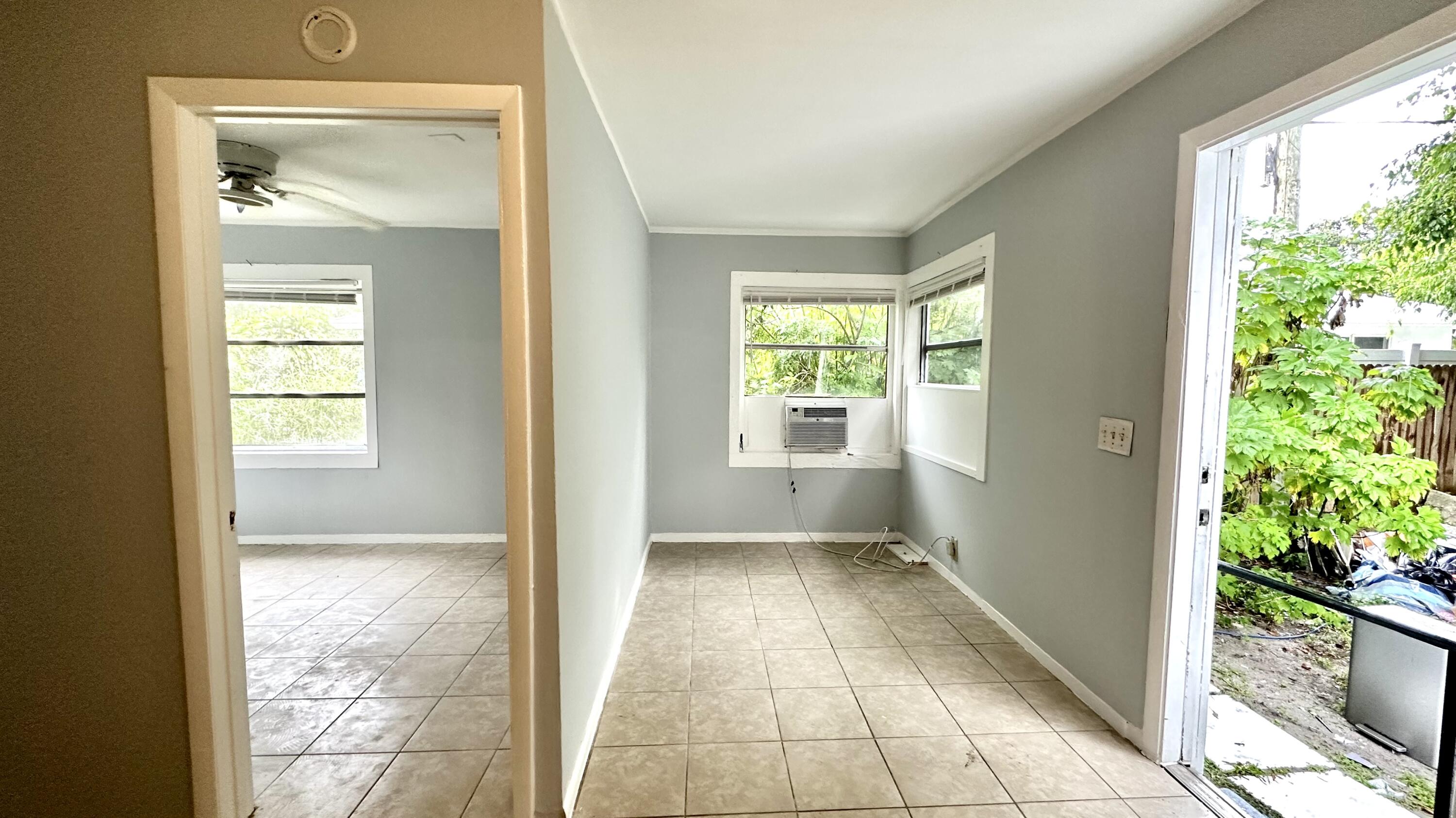 3804 Miller Avenue, Unit C West Palm Beach, FL 33405 - Photo 10 of 10 a view of an entryway of the house and a yard