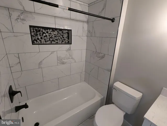 a utility room with washer and dryer