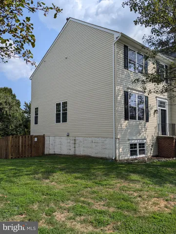 a view of outdoor space with deck and furniture