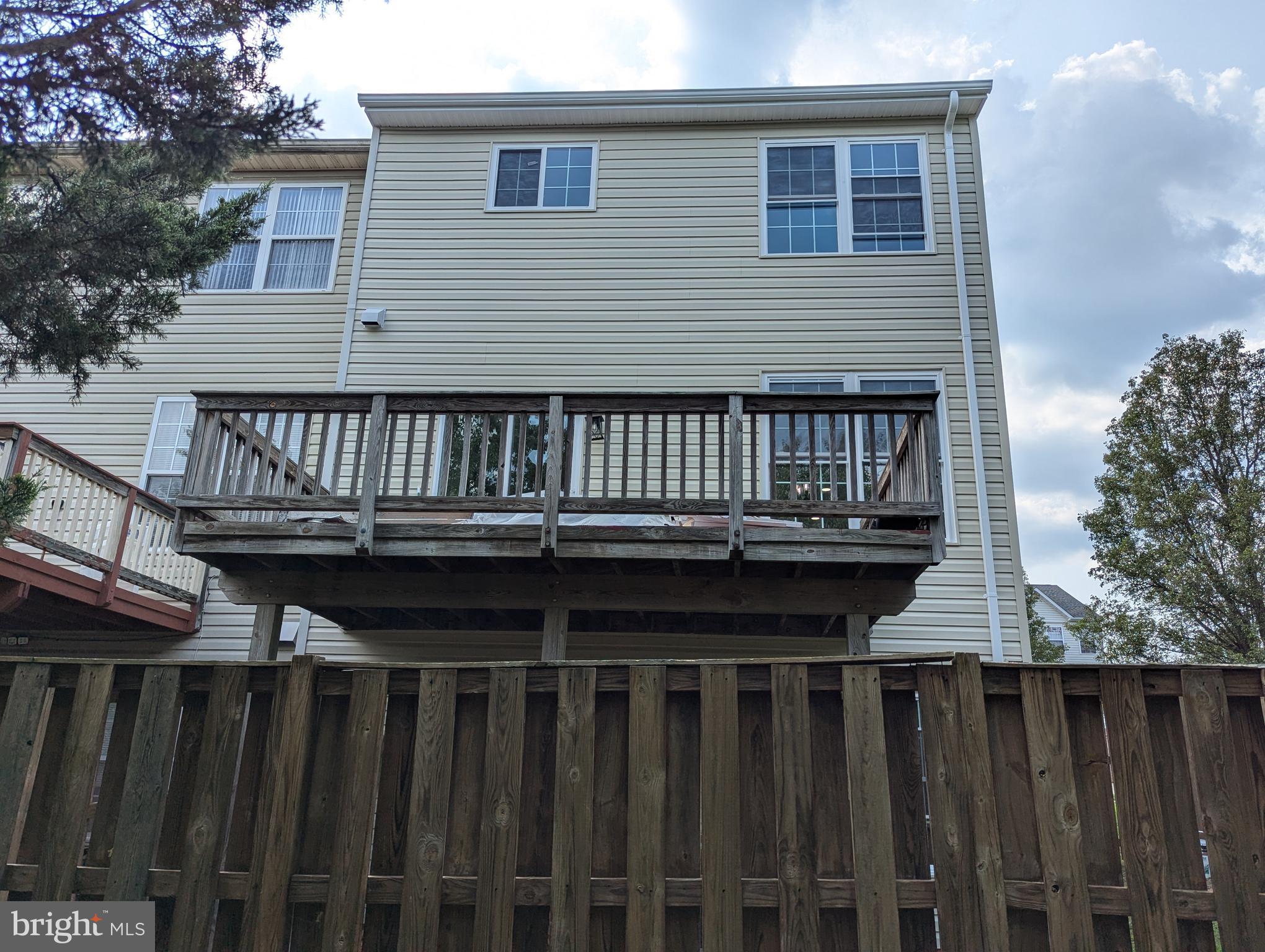 17415 Denali Place Dumfries, VA 22025 - Photo 46 of 55 a view of outdoor space with deck and furniture
