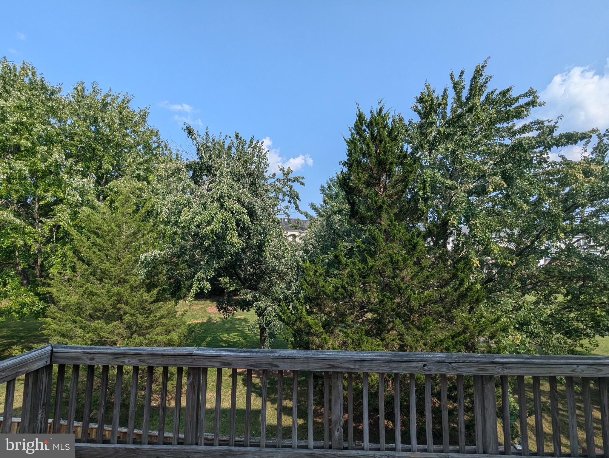 17415 Denali Place Dumfries, VA 22025 - Photo 49 of 55 a balcony with trees in front of it