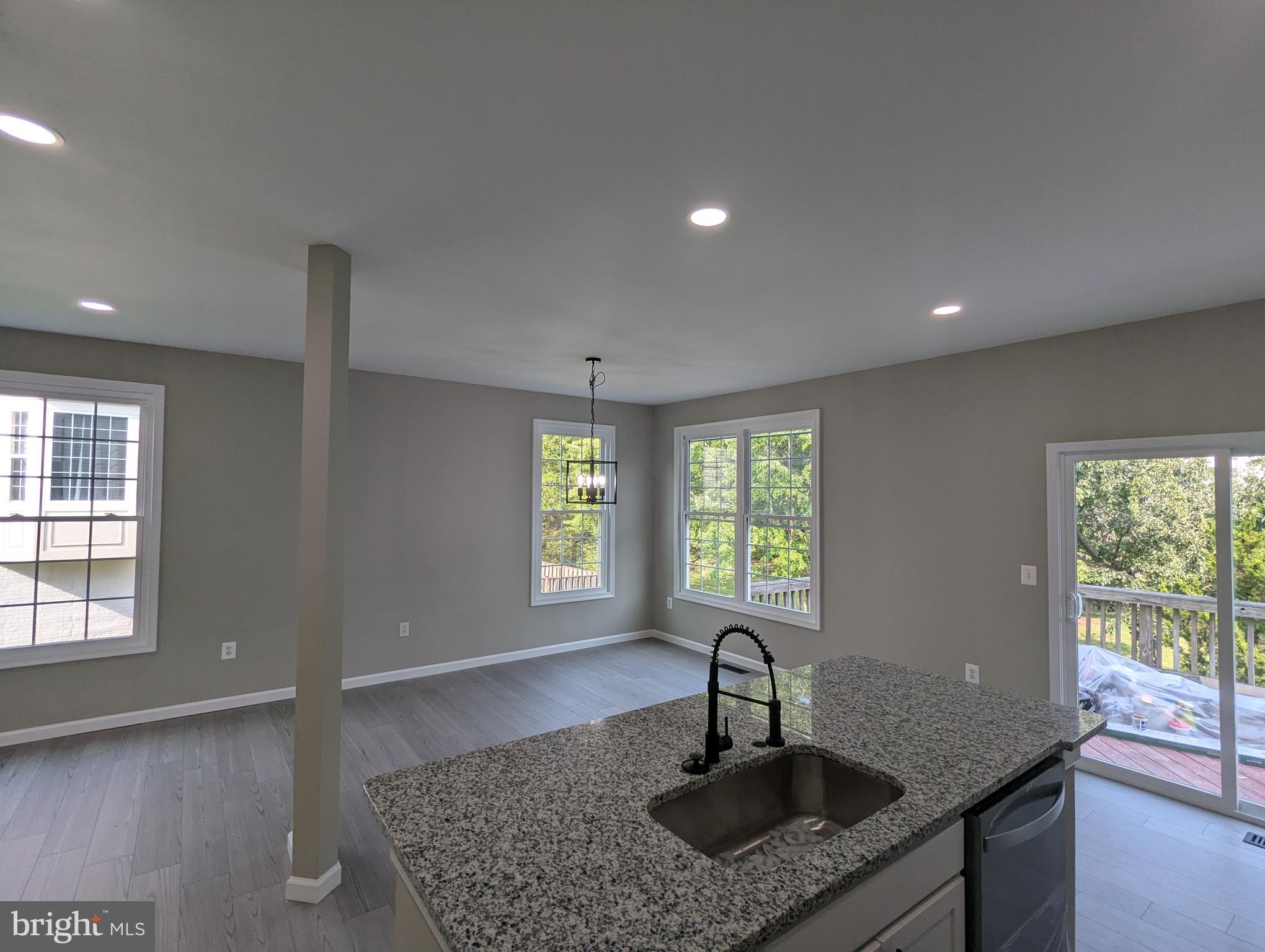 17415 Denali Place Dumfries, VA 22025 - Photo 8 of 55 a kitchen with sink and window
