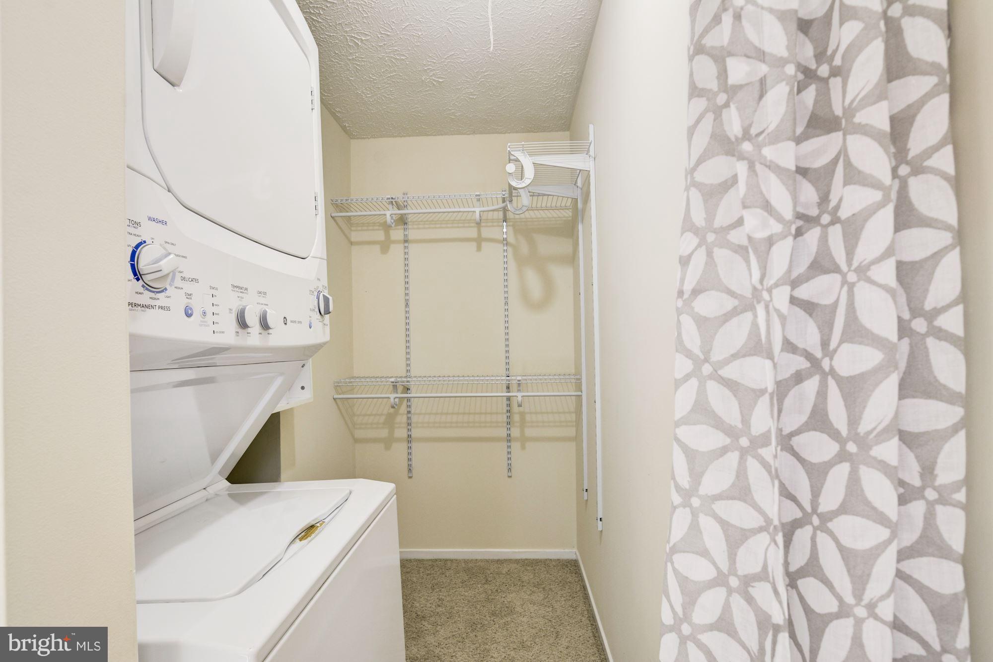 7621 Fallswood Way Lorton, VA 22079 - Photo 15 of 26 a bathroom with a sink a toilet and shower