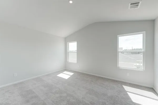 an empty room with windows