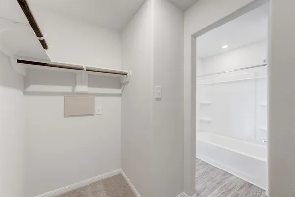 a view of small space with racks on the wall