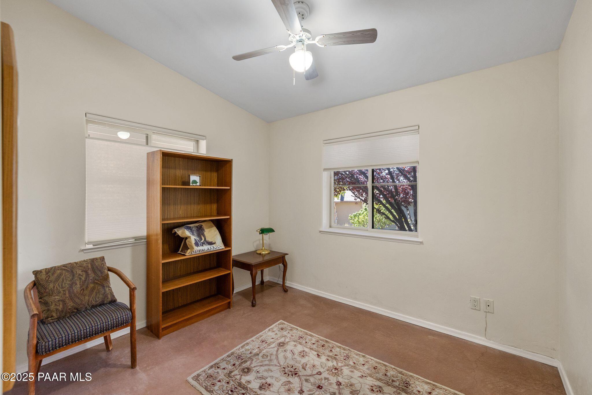 277 Jacob Lane Prescott, AZ 86303 - Photo 13 of 38 a living room with furniture and a rug