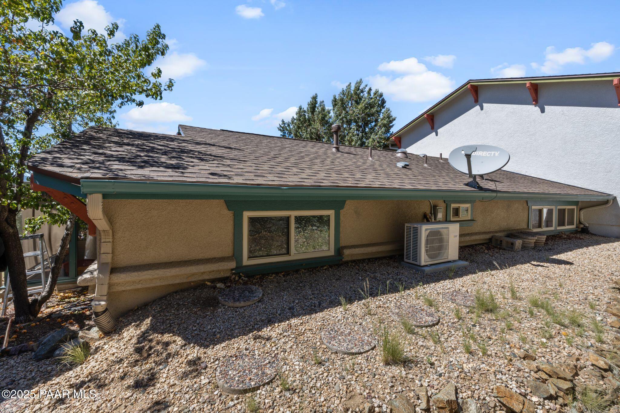 277 Jacob Lane Prescott, AZ 86303 - Photo 20 of 38 a front view of a house with parking space