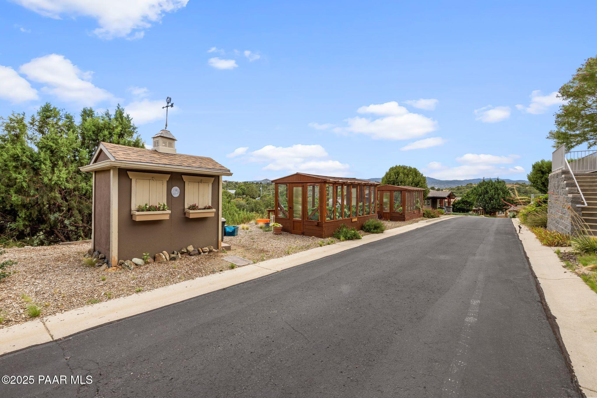 277 Jacob Lane Prescott, AZ 86303 - Photo 27 of 38 a front view of a house with a yard