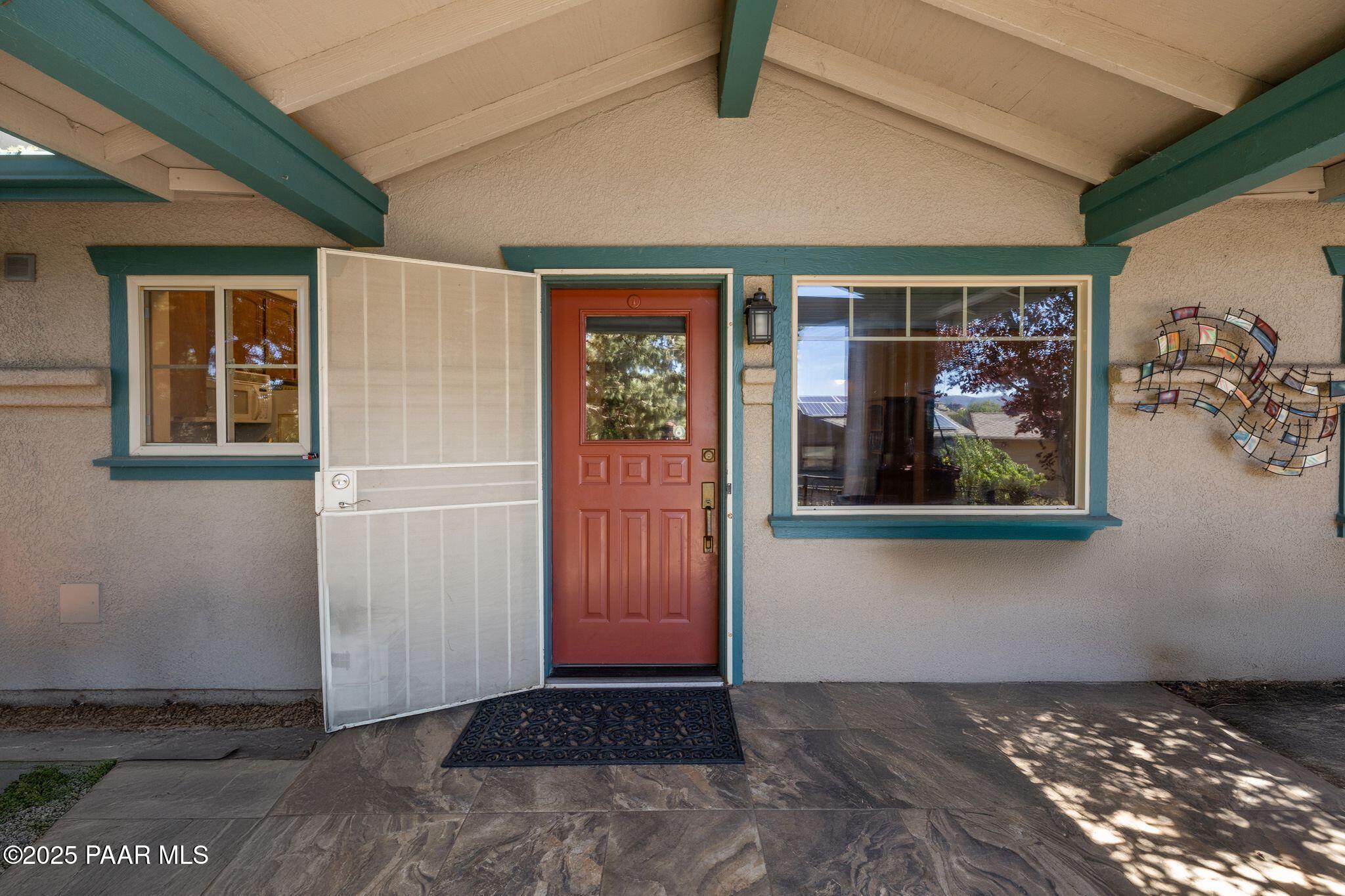277 Jacob Lane Prescott, AZ 86303 - Photo 5 of 38 a view of an entryway with a window