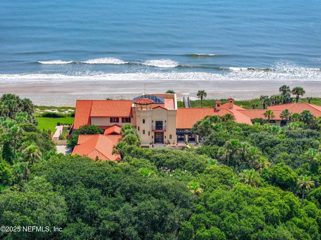 a view of two chairs in a patio
