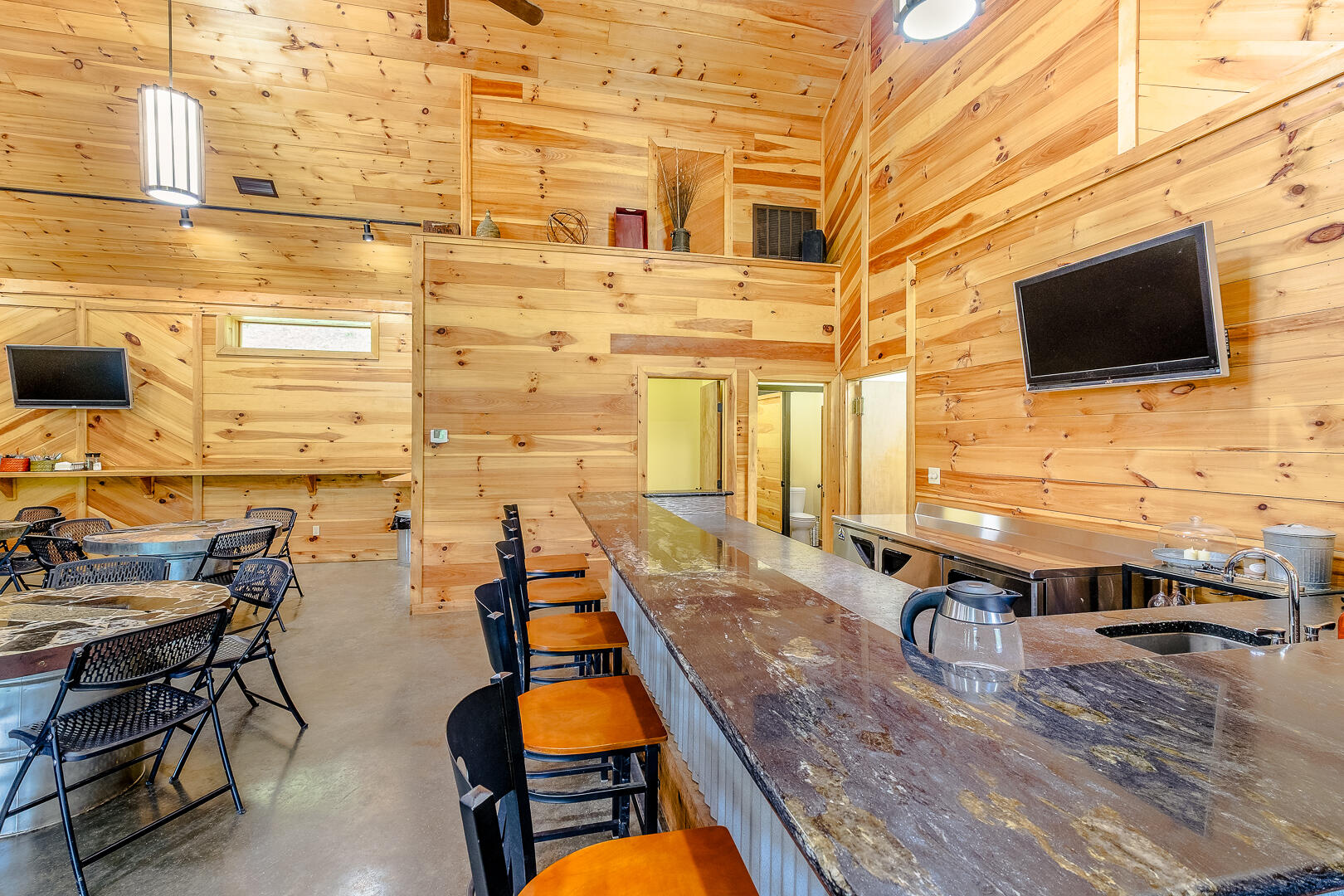 57 Hemlock Ridge Lane Catawba, VA 24070 - Photo 67 of 89 a backyard of a house with barbeque oven table and chairs